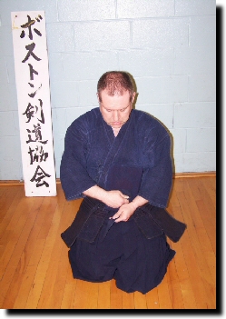 Wrap strings around waist and tie in front