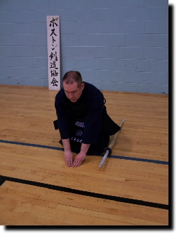 Place right hand on floor